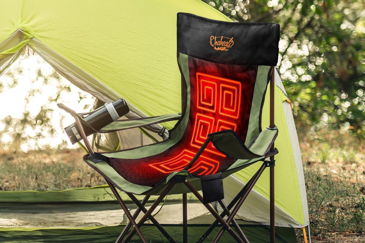 Chaheati 11v chair cover turned on at a scenic campsite by tent.
